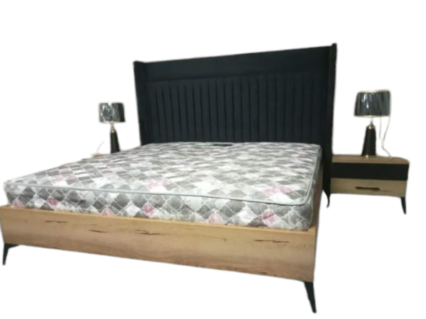 grey cushioned bed by homodenza